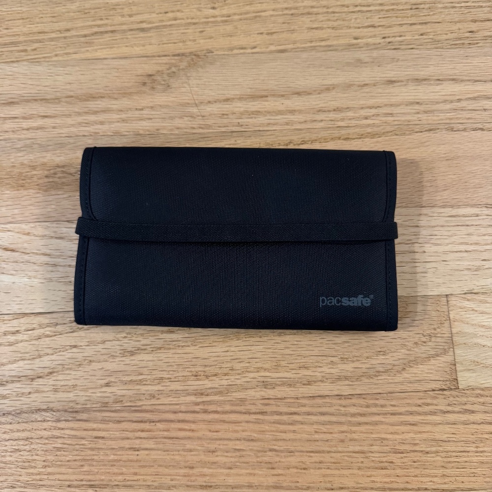 Packsafe RFID accordion style security wallet, black, very good condition.